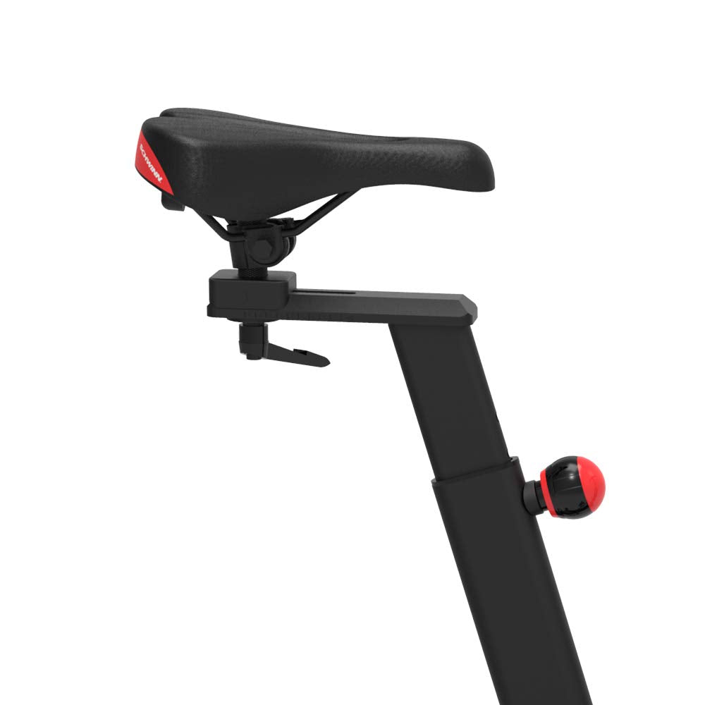 Black bike saddle with red accents on a white background