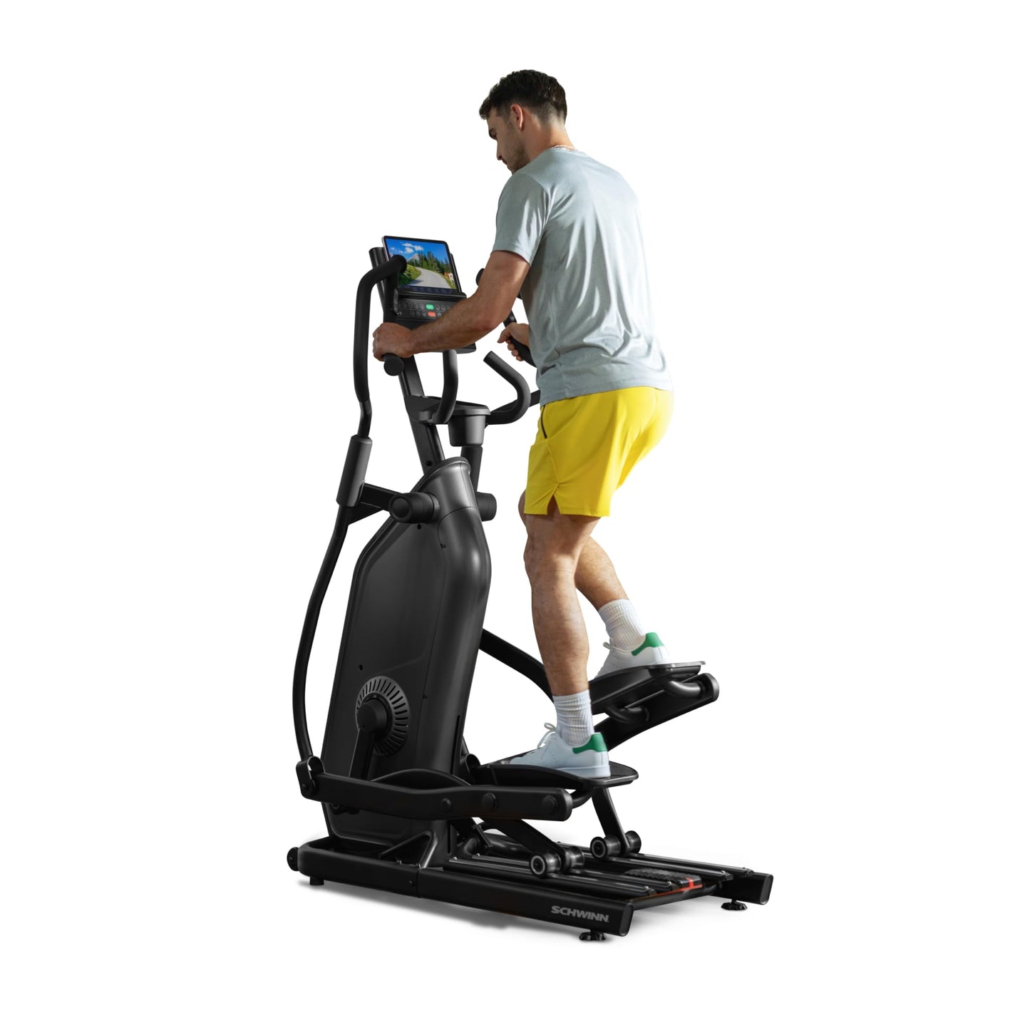 Person using aelliptical machine on a white background