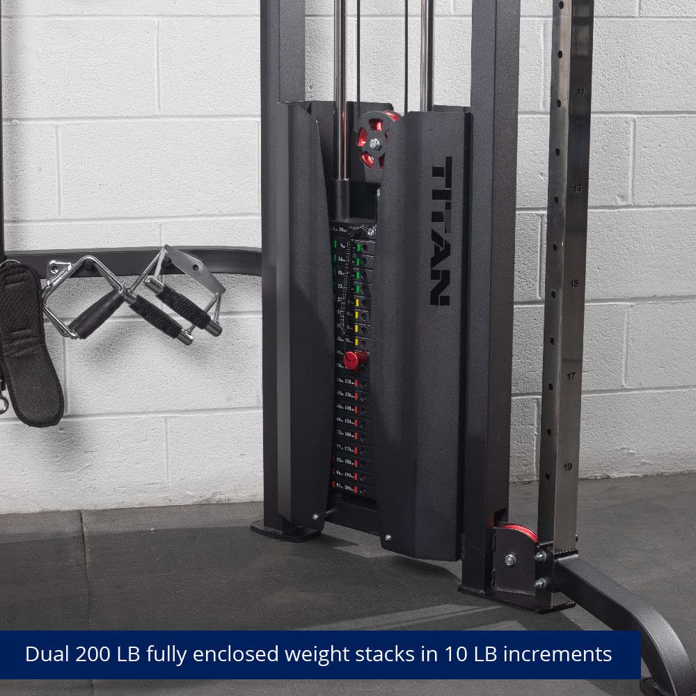 Gym equipment with Titan branding and weight stack details against a tiled wall.