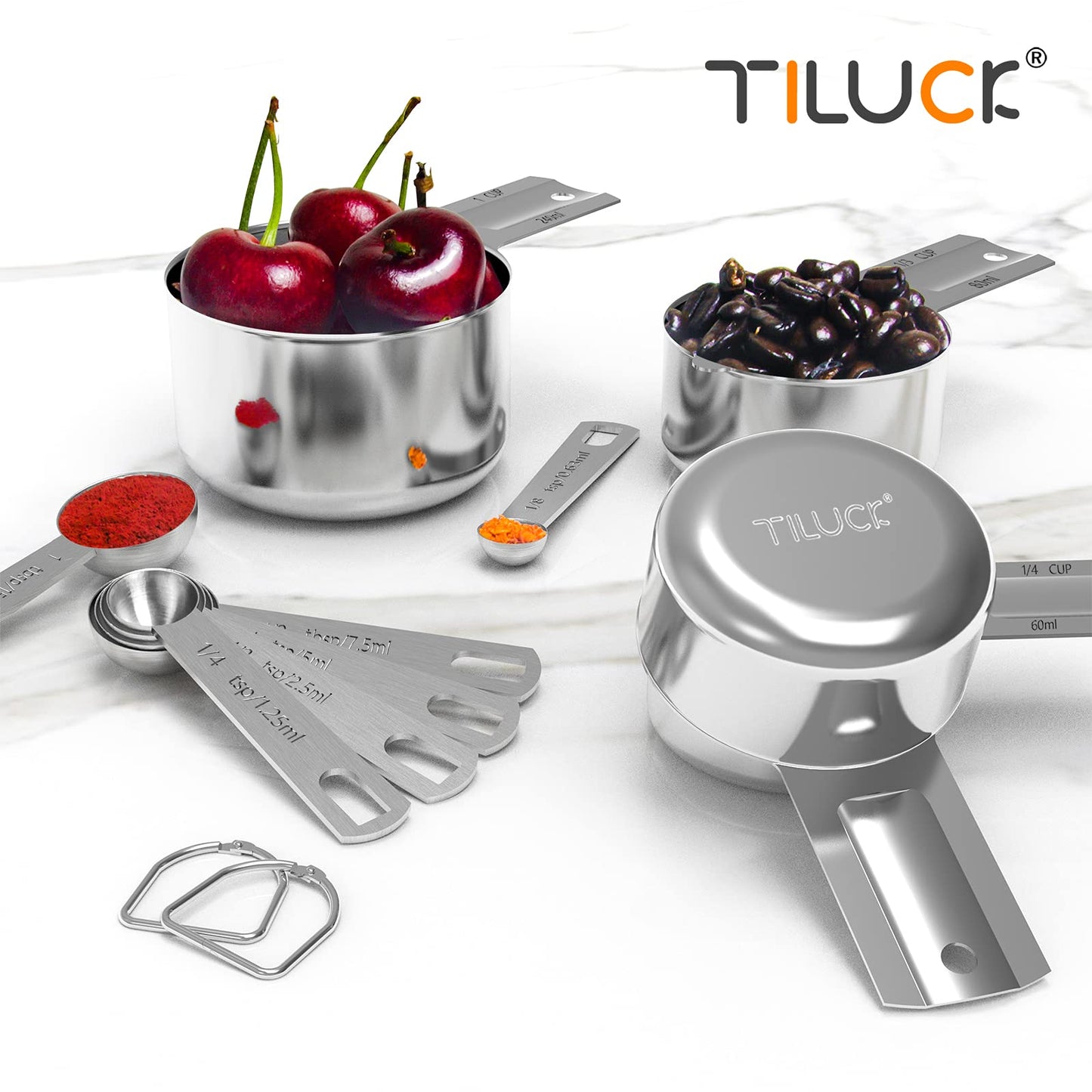 Stainless steel measuring cups and spoons with TILUCK branding on a white background