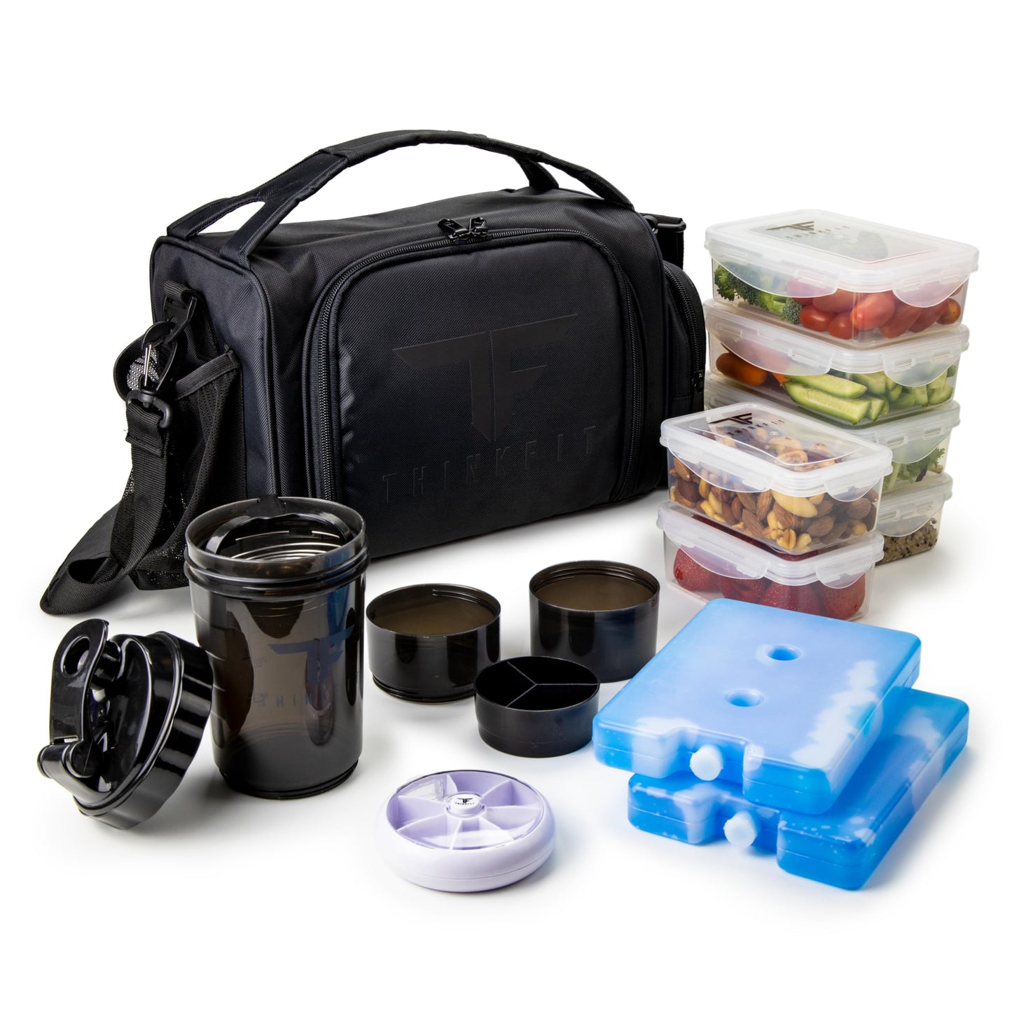 Black insulated lunch bag with food containers and accessories on a white background