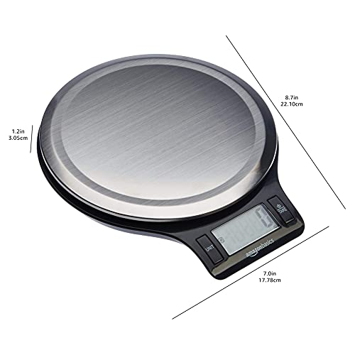 Digital kitchen scale with a metallic platform on a white background
