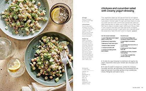 Chickpea and cucumber salad with creamy yogurt dressing on a plate, accompanied by a glass of lemonade.