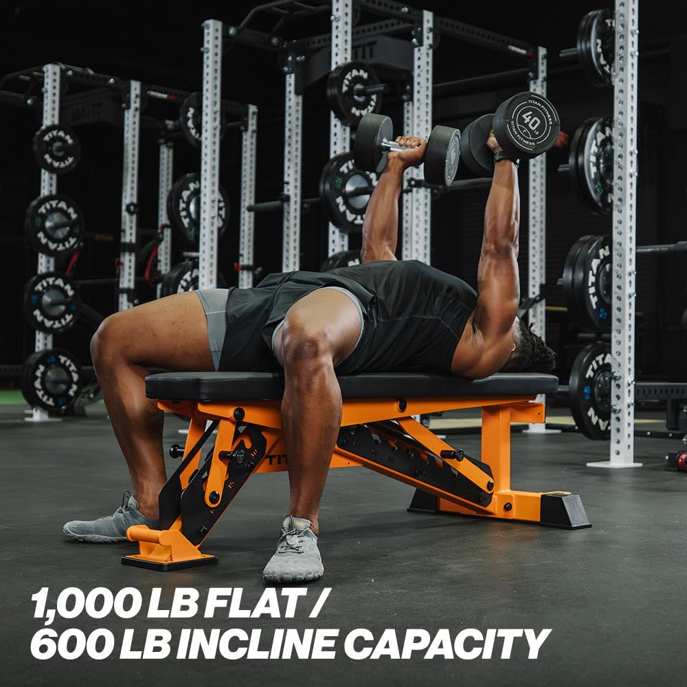 Person performing bench press with weights in a gym setting, featuring a weight bench with capacity text.