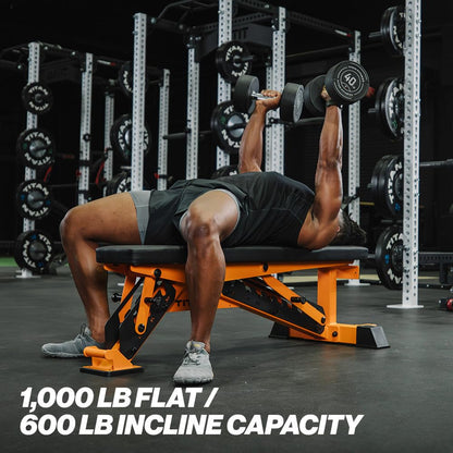 Person performing bench press with weights in a gym setting, featuring a weight bench with capacity text.