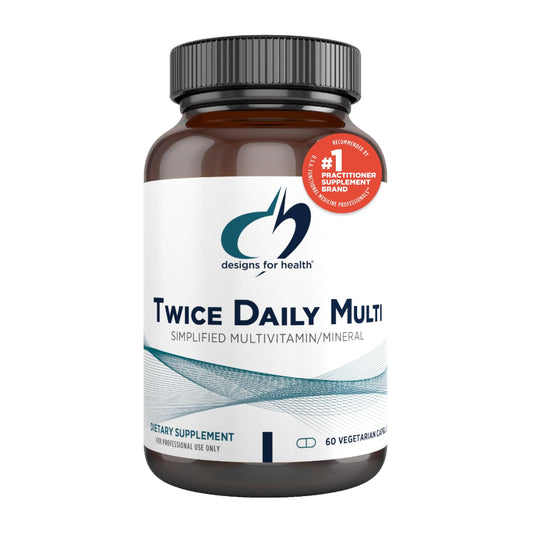 Supplement bottle labeled 'Twice Daily Multi' by designs for health on a white background