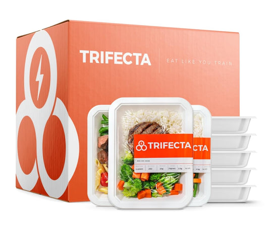 TRIFECTA meal prep containers with a branded box in the background