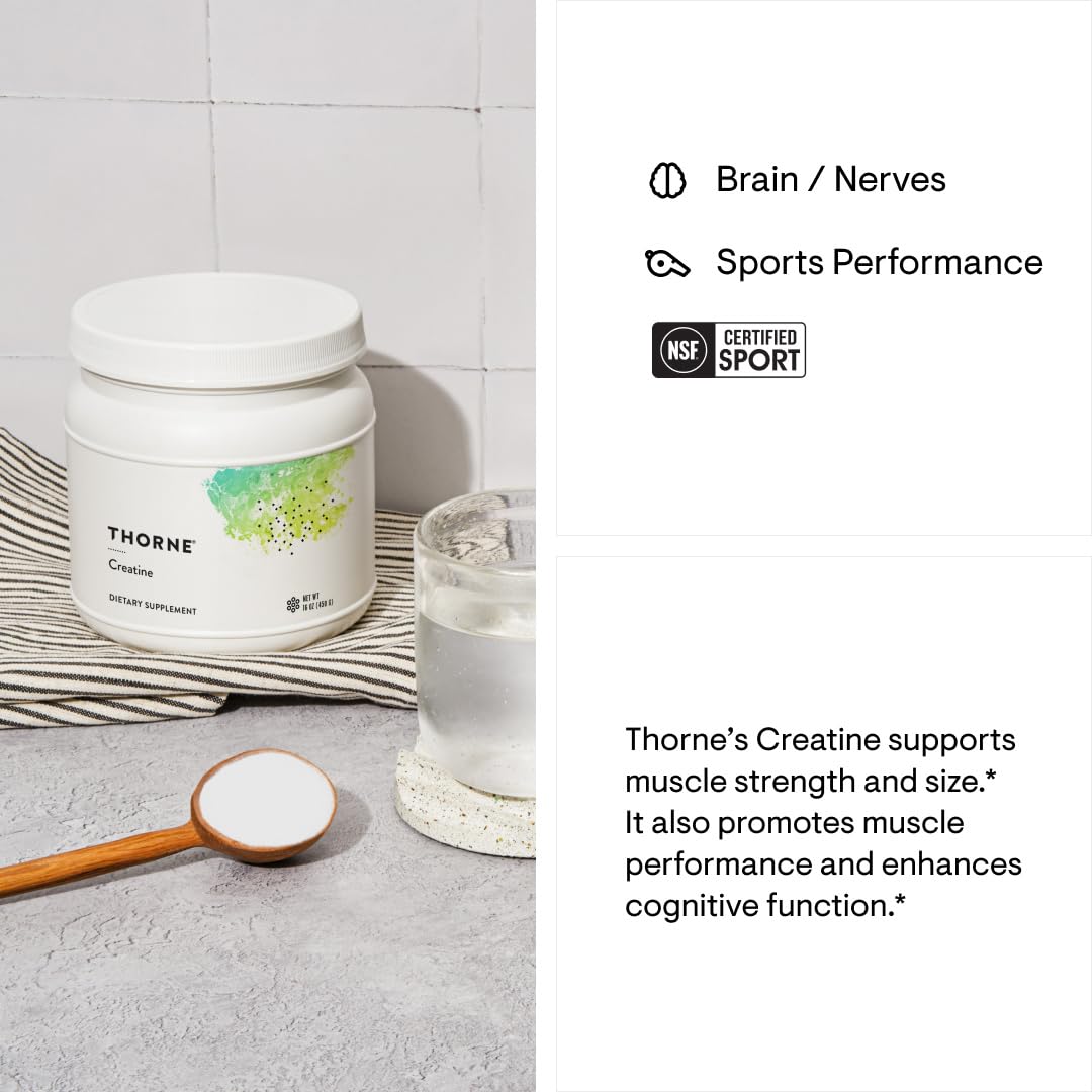 Thorne Creatine supplement container with a glass of water and wooden scoop on a light surface.