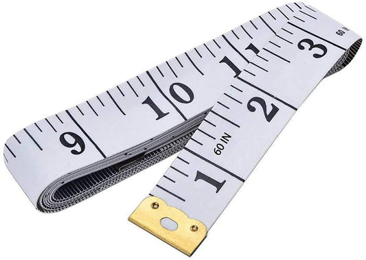 Measuring tape with white surface and black markings on a white background