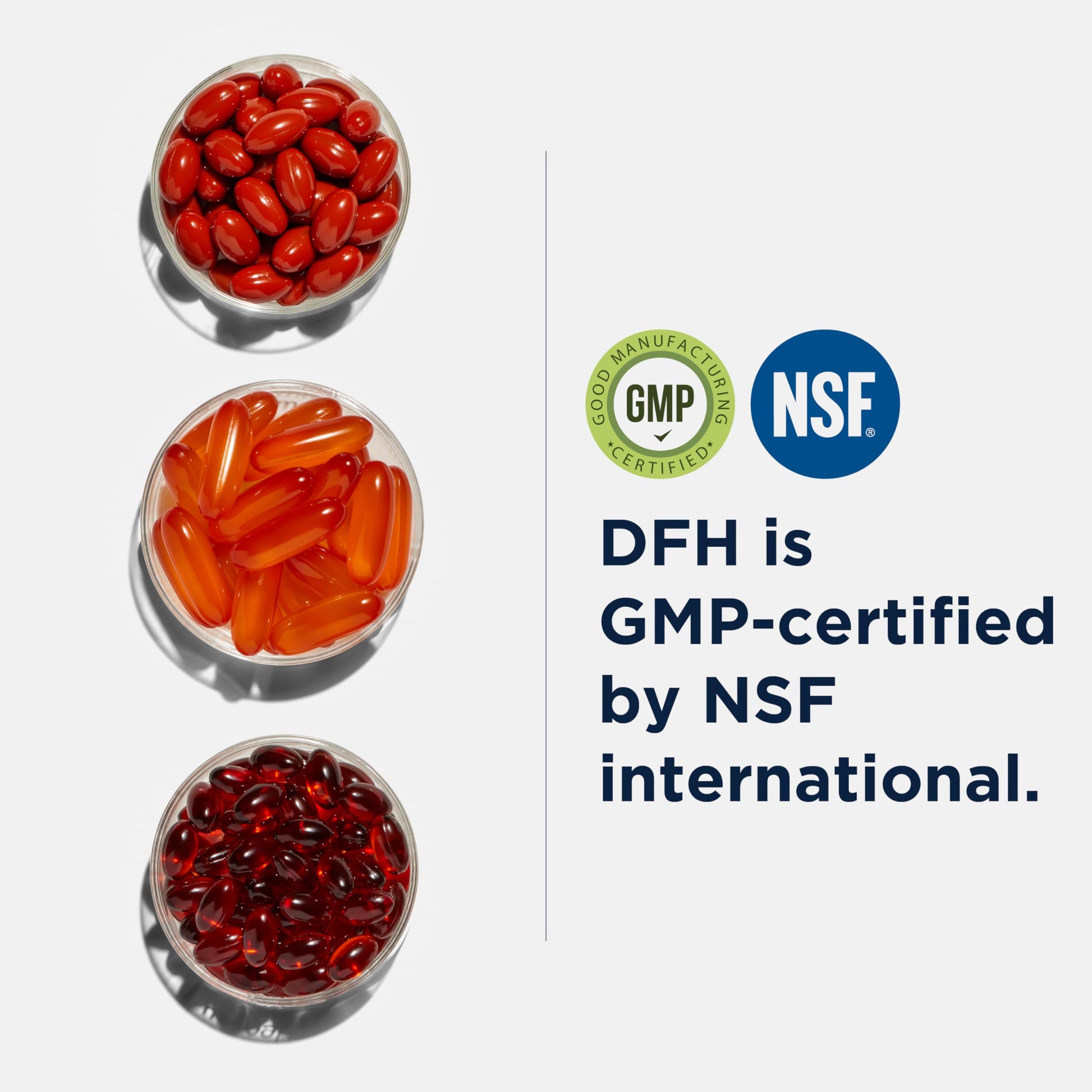 Three bowls of red and orange capsules with GMP and NSF logos on a white background.