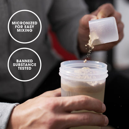 Person pouring a powder into a container with text about micronized powder and banned substance testing.