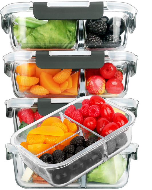 Stackable food storage containers with compartments filled with fruits and vegetables.