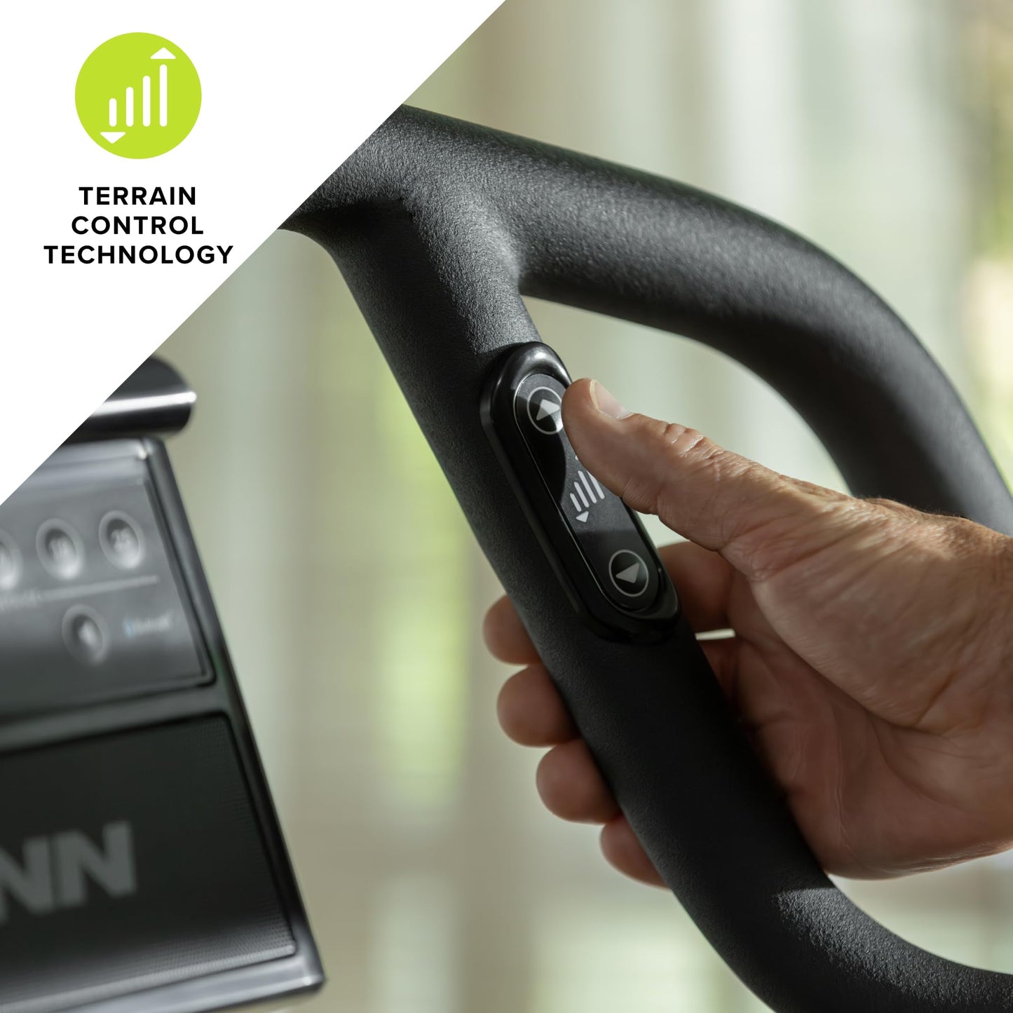 Steering wheel with control buttons and 'Terrain Control Technology' label