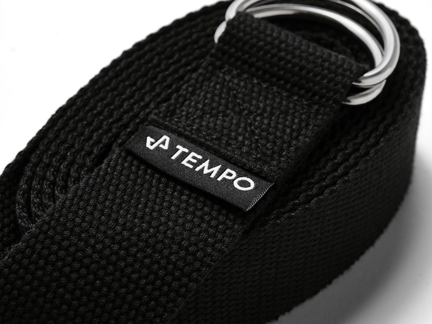 Black belt with a Tempo logo on a white background