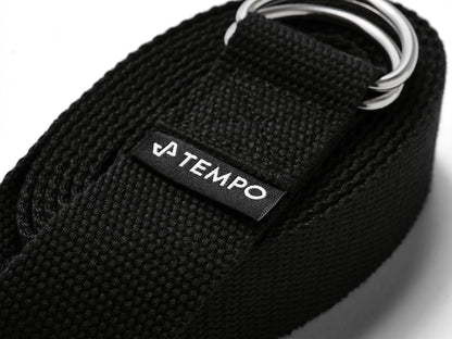 Black belt with a Tempo logo on a white background