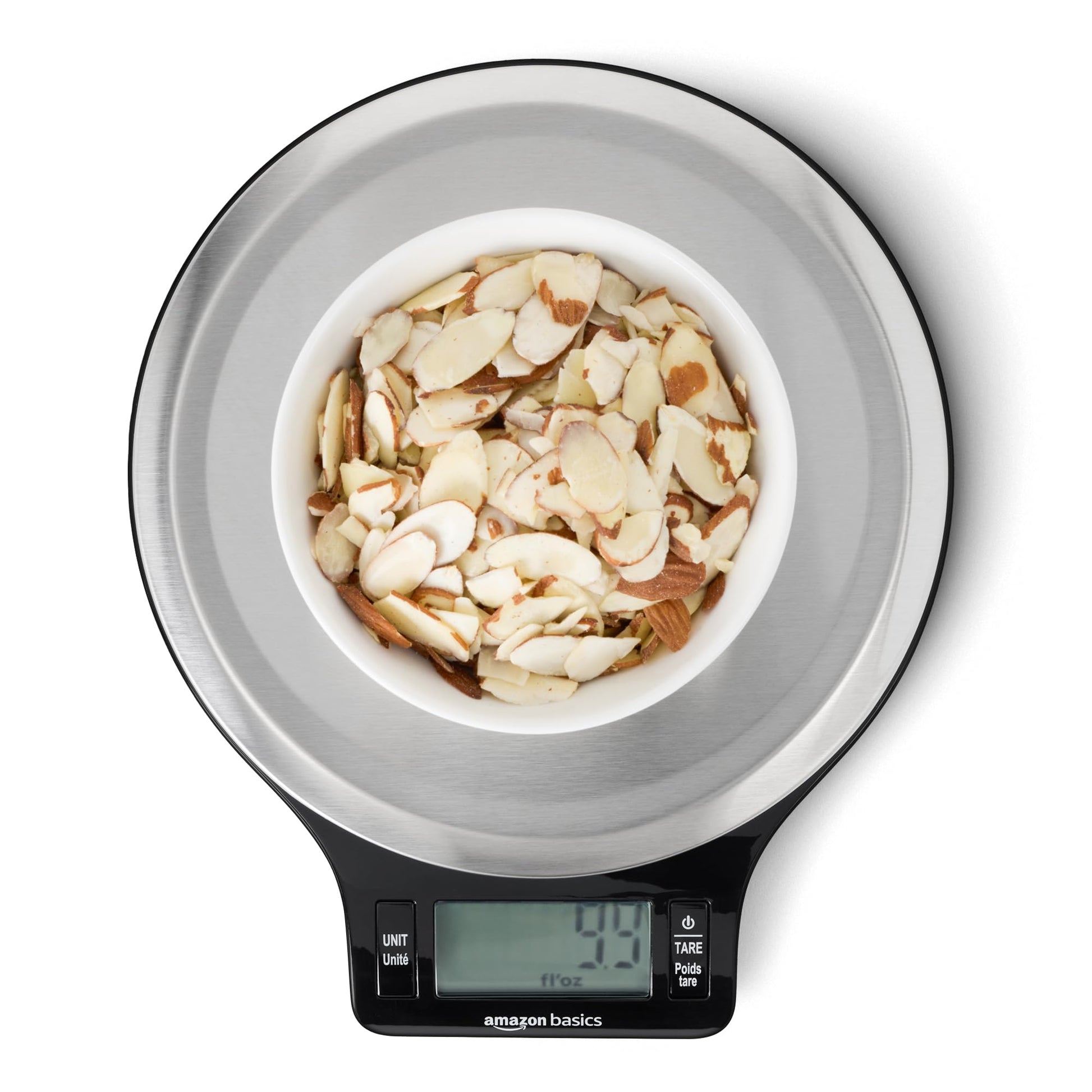Digital kitchen scale with a bowl of almonds on a white background