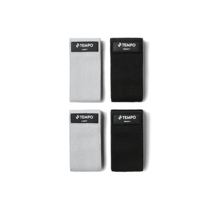 Four Tempo products in black and gray on a white background