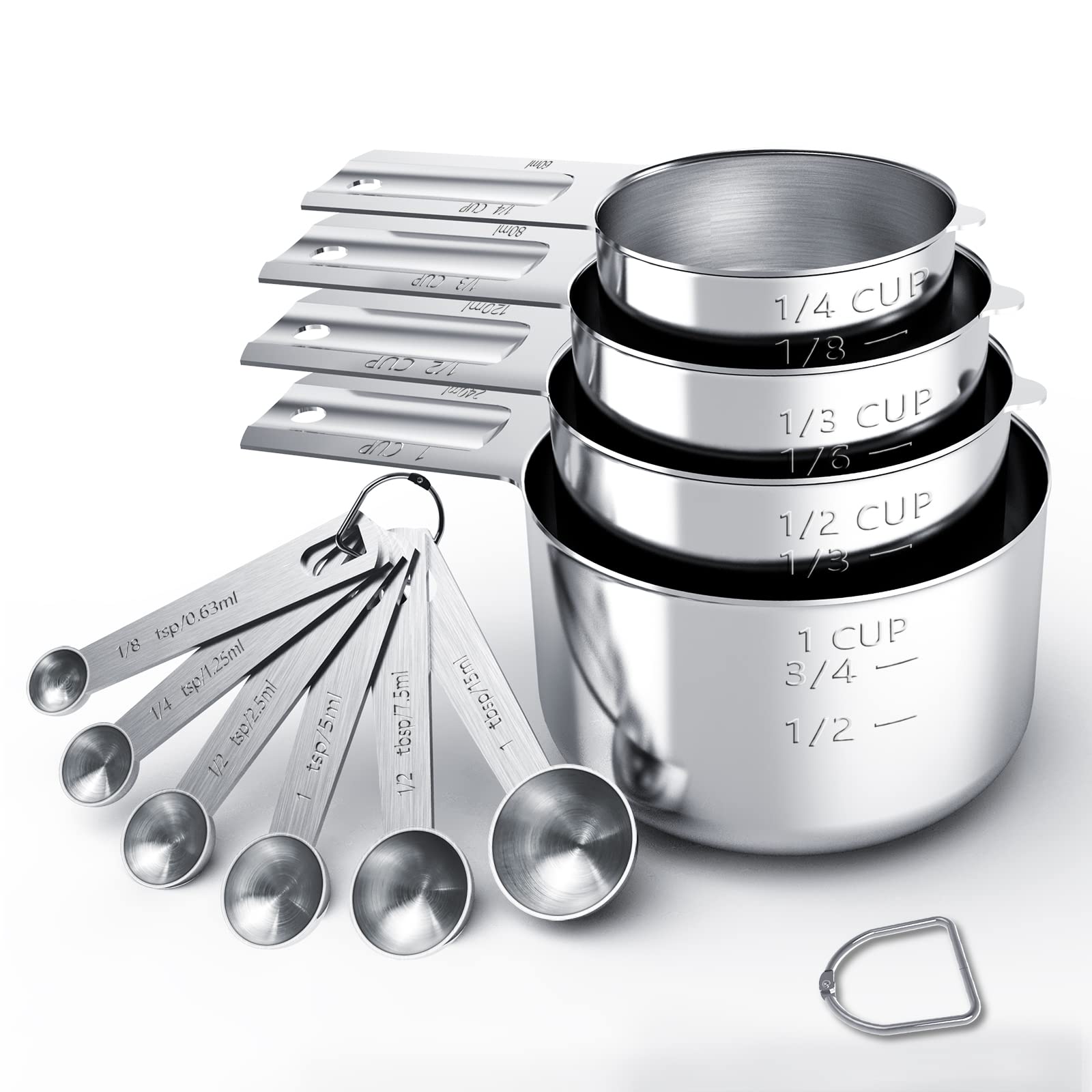Set of stainless steel measuring cups and spoons on a white background