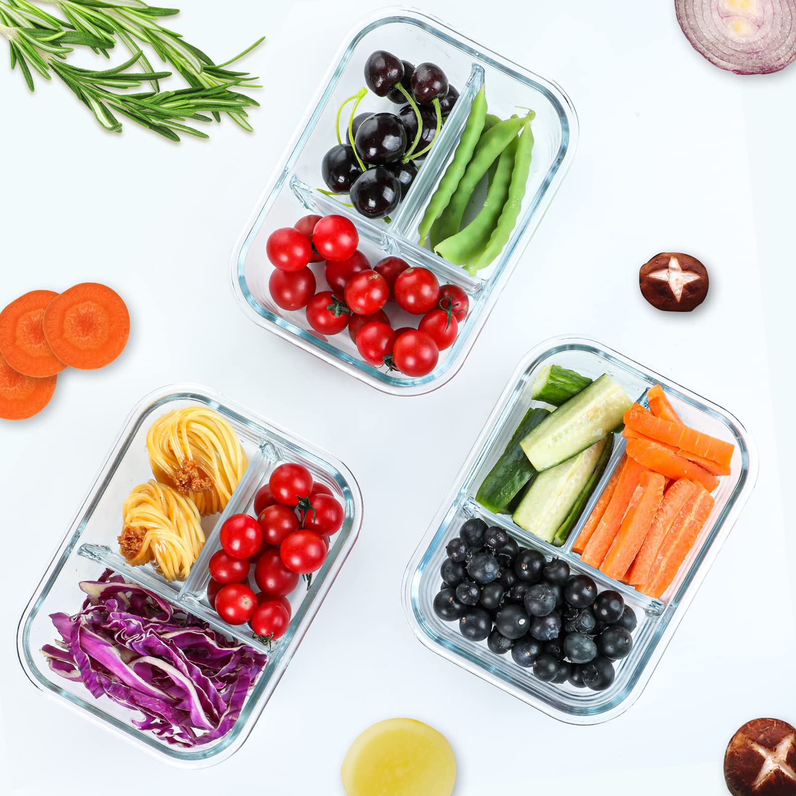 Glass meal prep containers with compartments of fruits, vegetables, and pasta on a white background.