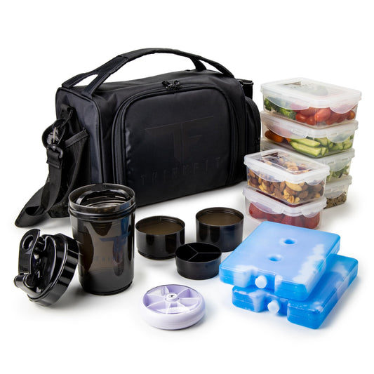 Black insulated lunch bag with food containers and accessories on a white background