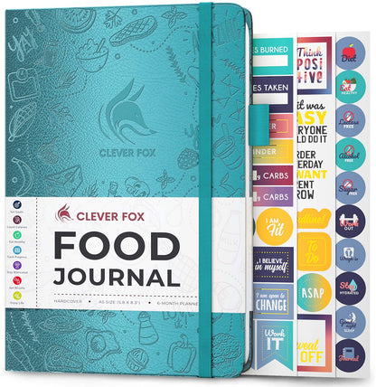 Teal food journal with stickers on a white background