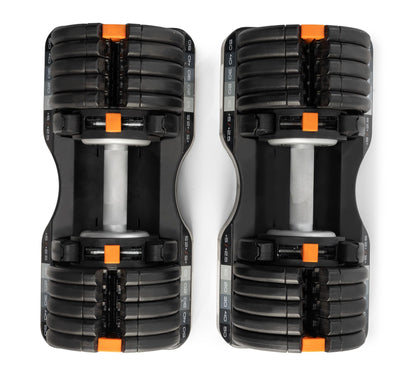 Pair of black and orange dumbbells on a white background