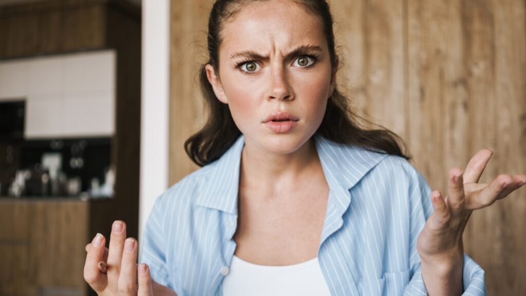 Confused woman reacting to common weight loss myths and misinformation