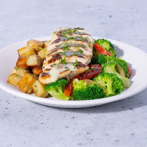 Trifecta GLP-1 friendly grilled chicken with roasted potatoes, broccoli, and peppers