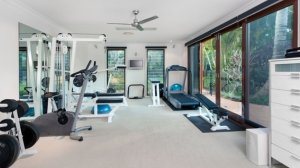 Home exercise equipment in a modern gym setup for weight loss solutions