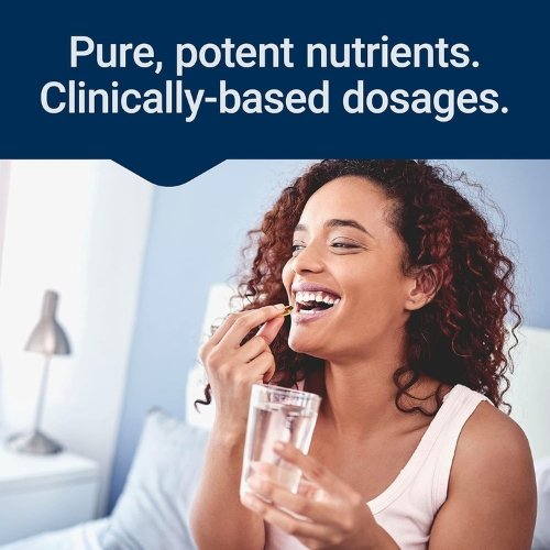 Smiling woman taking a Life Extension multivitamin with water emphasizing pure potent nutrients